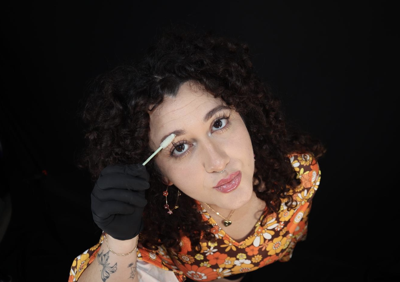 Jackiee doing brow shaping with spoolie brush