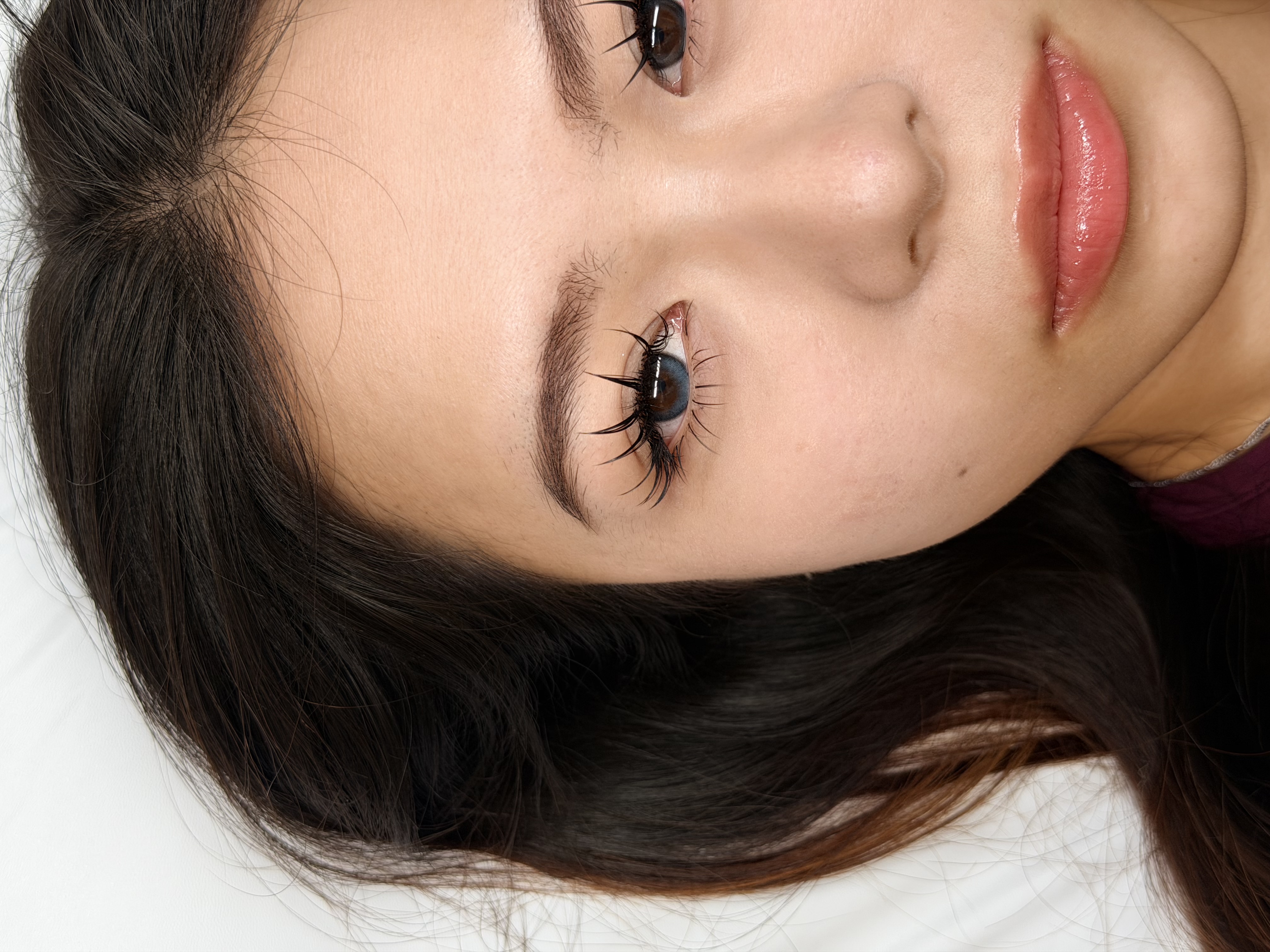 Client lash closeup showing volume lash extensions